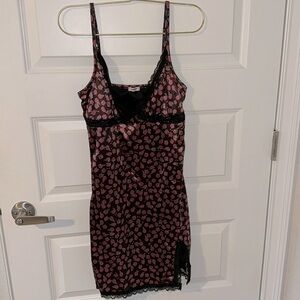 Garage- floral dress with lace. 
Lined. Adjustable straps. Size small.